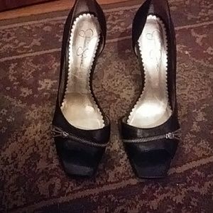 Sexy zippered black heels.